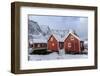 Fresh Snow Covering the Typical Norwegian Homes, the Rorbu, in the Lofoten Islands, Arctic, Norway-Roberto Moiola-Framed Photographic Print