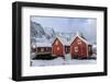 Fresh Snow Covering the Typical Norwegian Homes, the Rorbu, in the Lofoten Islands, Arctic, Norway-Roberto Moiola-Framed Photographic Print