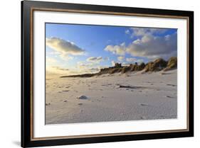 Fresh Spring Snow at Dawn Highlight Ripples and Marks in the Sand Beneath Bamburgh Castle-Eleanor-Framed Photographic Print