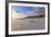 Fresh Spring Snow at Dawn Highlight Ripples and Marks in the Sand Beneath Bamburgh Castle-Eleanor-Framed Photographic Print