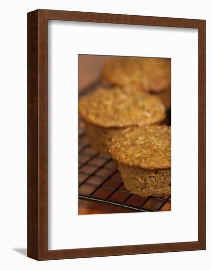 Freshly baked zucchini muffins cooling on a wire rack-Janet Horton-Framed Photographic Print