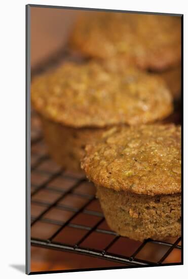 Freshly baked zucchini muffins cooling on a wire rack-Janet Horton-Mounted Photographic Print