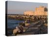 Friends and Couples Gather at Sunset Outside the Citadel of Quatbai, Alexandria, Egypt-Julian Love-Stretched Canvas