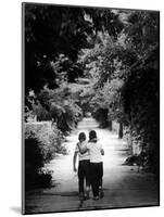 Friends Taking a Walk on a Typical Summer Day-Robert W^ Kelley-Mounted Photographic Print