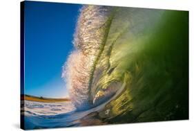 Frilly Lip-A powerful breaking wave backlit at sunrise, Hawaii-Mark A Johnson-Stretched Canvas