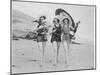 Frolicsome Trio of American Bathing Beauties Wearing the Latest Swimsuit Costumes-Emil Otto Hopp?-Mounted Photographic Print