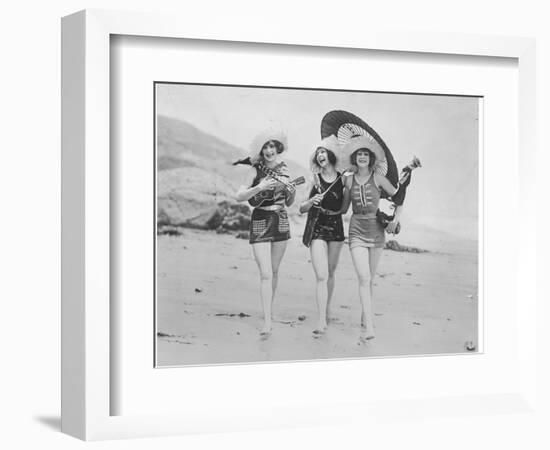 Frolicsome Trio of American Bathing Beauties Wearing the Latest Swimsuit Costumes-Emil Otto Hopp?-Framed Photographic Print