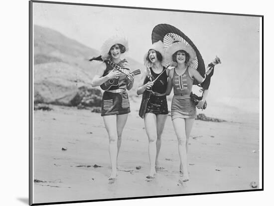 Frolicsome Trio of American Bathing Beauties Wearing the Latest Swimsuit Costumes-Emil Otto Hopp?-Mounted Premium Photographic Print