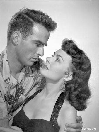 https://imgc.allpostersimages.com/img/posters/from-here-to-eternity-man-about-to-kiss-a-woman-in-black_u-L-Q1165180.jpg?artPerspective=n