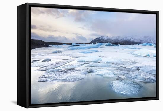 Frozen Icebergs in the Frozen Waters of Fjallsarlon Glacier Lagoon, South East Iceland, Iceland-Neale Clark-Framed Stretched Canvas