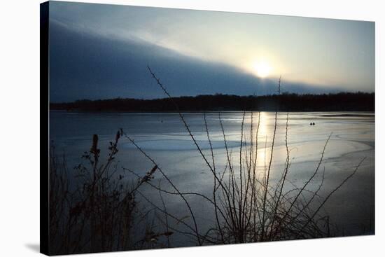Frozen lake sunset, Eagle Creek Park, Indianapolis, Indiana, USA-Anna Miller-Stretched Canvas