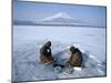 Frozen Lake with Fishermen, Lake Yamanaka, Mount Fuji, Honshu, Japan-null-Mounted Premium Photographic Print