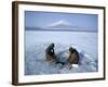 Frozen Lake with Fishermen, Lake Yamanaka, Mount Fuji, Honshu, Japan-null-Framed Photographic Print