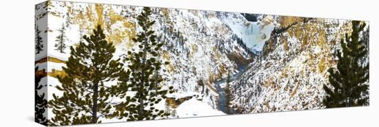 Frozen waterfall seen from Artist Point in winter snow. Yellowstone National Park. Wyoming.-Tom Norring-Stretched Canvas