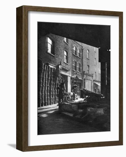 Fruit Baskets Piled Against Houses at Borough Market, London, 1926-1927-Whiffin-Framed Giclee Print