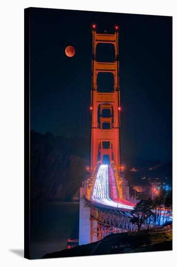 Full blood red moon rising over the Golden Gate Bridge in San Francisco, view from Battery Cranston-David Chang-Stretched Canvas