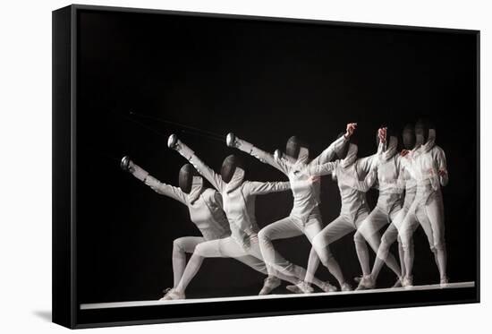 Full-Length Portrait of Woman Wearing White Fencing Costume and Black Fencing Mask Practicing with-master1305-Framed Stretched Canvas