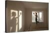 Full Length Rear View of Young Woman Cleaning Window in New Apartment-Nosnibor137-Stretched Canvas