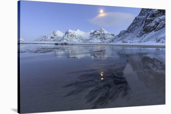 Full Moon Reflected in the Icy Sea around the Surreal Skagsanden Beach, Flakstad, Nordland County-Roberto Moiola-Stretched Canvas