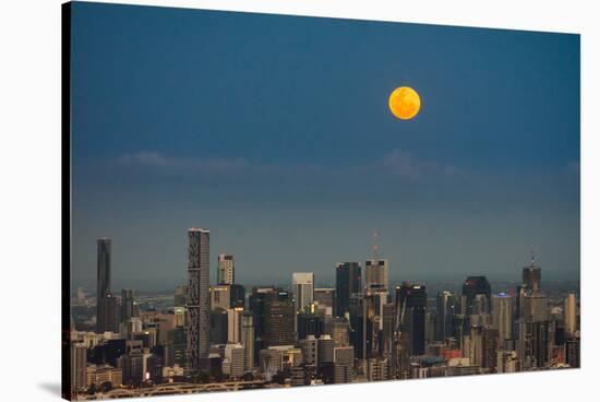 Full moon rising over Brisbane city, Queensland, Australia-Mark A Johnson-Stretched Canvas