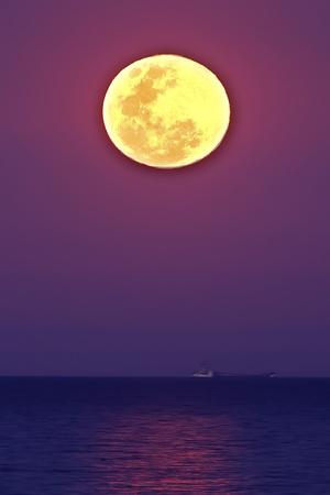 https://imgc.allpostersimages.com/img/posters/full-moon-rising-over-the-sea_u-L-Q1G0JSY0.jpg?artPerspective=n