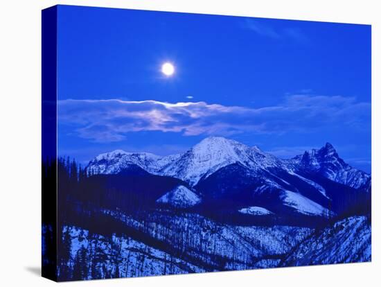 Full Moonrise over the Cloudcroft Peaks in Glacier National Park, Montana, USA-Chuck Haney-Stretched Canvas