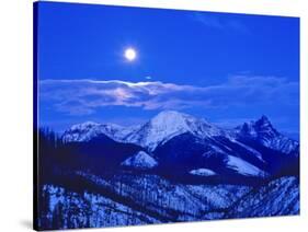Full Moonrise over the Cloudcroft Peaks in Glacier National Park, Montana, USA-Chuck Haney-Stretched Canvas