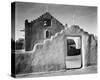 Full side view of entrance with gate to the right, Church, Taos Pueblo National Historic Landmark,-Ansel Adams-Stretched Canvas