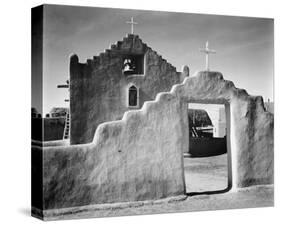 Full side view of entrance with gate to the right, Church, Taos Pueblo National Historic Landmark,-Ansel Adams-Stretched Canvas