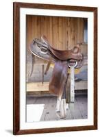 Full view of a Saddle resting on the railing, Tucson, Arizona, USA.-Julien McRoberts-Framed Premium Photographic Print