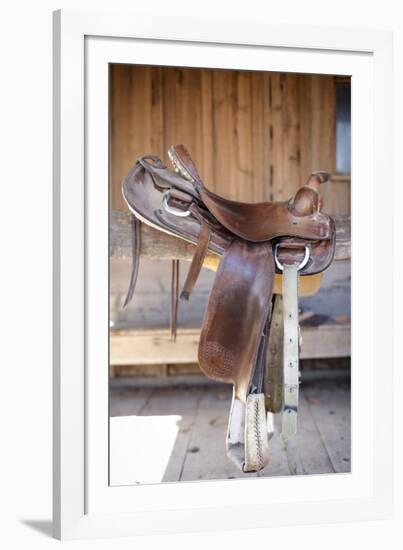 Full view of a Saddle resting on the railing, Tucson, Arizona, USA.-Julien McRoberts-Framed Photographic Print