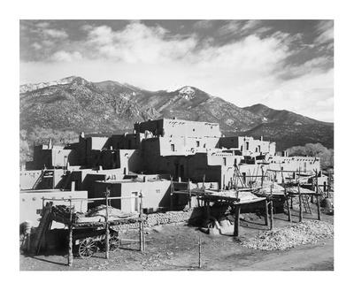 https://imgc.allpostersimages.com/img/posters/full-view-of-city-mountains-in-background-taos-pueblo-national-historic-landmark-new-mexico-194_u-L-F8V5P00.jpg?artPerspective=n