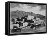 Full View Of City Mountains In Bkgd "Taos Pueblo National Historic Landmark New Mexico 1941"-Ansel Adams-Framed Stretched Canvas