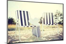 Furniture and Summer Holidays Concept - Two Beach Lounges with Beach Bag and White Hat on the Beach-dolgachov-Mounted Photographic Print