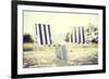 Furniture and Summer Holidays Concept - Two Beach Lounges with Beach Bag and White Hat on the Beach-dolgachov-Framed Photographic Print