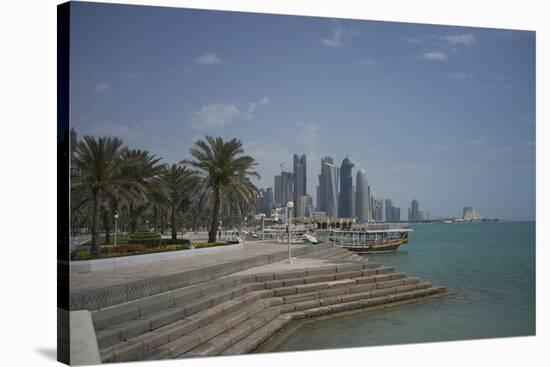 Futuristic Skyscrapers on the Distant Doha Skyline, Qatar, Middle East-Angelo Cavalli-Stretched Canvas