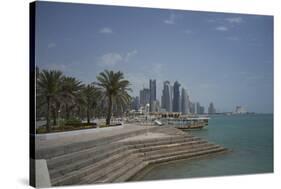 Futuristic Skyscrapers on the Distant Doha Skyline, Qatar, Middle East-Angelo Cavalli-Stretched Canvas
