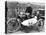 FW Dixon on a Harley-Davidson, with a Passenger in the Sidecar, 1921-null-Stretched Canvas