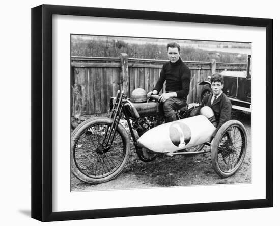FW Dixon on a Harley-Davidson, with a Passenger in the Sidecar, 1921-null-Framed Photographic Print