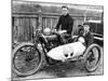 FW Dixon on a Harley-Davidson, with a Passenger in the Sidecar, 1921-null-Mounted Photographic Print