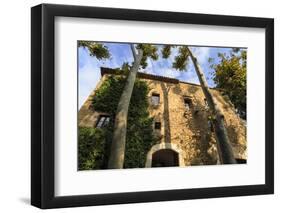 Gala Dali Castle Museum facade amidst tall trees, medieval home of Salvador Dali, Pubol, Baix Empor-Eleanor Scriven-Framed Premium Photographic Print