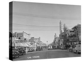 Gambling Establishments and Clubs Lining the Street-Peter Stackpole-Stretched Canvas