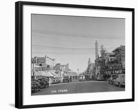 Gambling Establishments and Clubs Lining the Street-Peter Stackpole-Framed Photographic Print