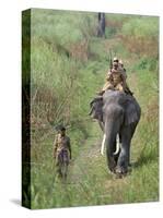 Game Guards Patrolling on Elephant Back, Kaziranga National Park, Assam State, India-Steve & Ann Toon-Stretched Canvas