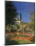 Garden in Bloom-Claude Monet-Mounted Art Print