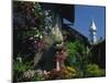 Garden of Village House with Church Spire Beyond, Yvoire, Haute-Savoie, Rhone-Alpes, France-Tomlinson Ruth-Mounted Photographic Print