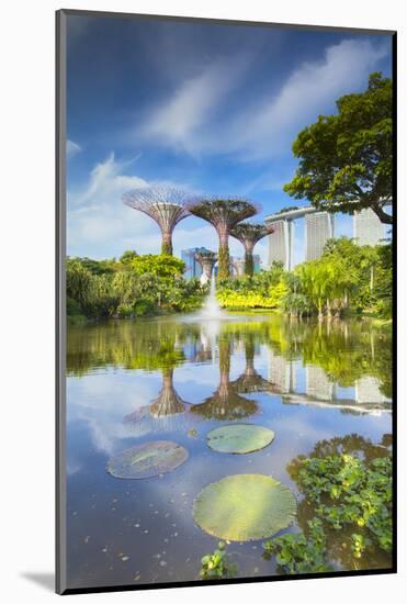 Gardens by the Bay and Marina Bay Sands Hotel, Singapore-Ian Trower-Mounted Photographic Print