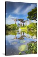 Gardens by the Bay and Marina Bay Sands Hotel, Singapore-Ian Trower-Stretched Canvas