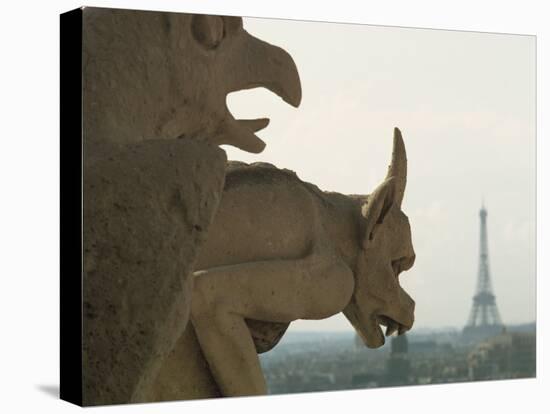 Gargoyles on Notre Dame Cathedral, and Beyond, the Eiffel Tower, Paris, France, Europe-Woolfitt Adam-Stretched Canvas