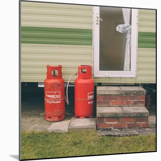 Gas Bottles by Caravan-Clive Nolan-Mounted Photographic Print